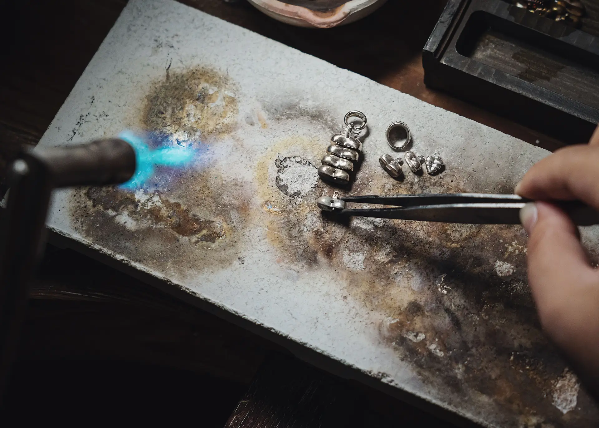 Jeweller working with silver wire