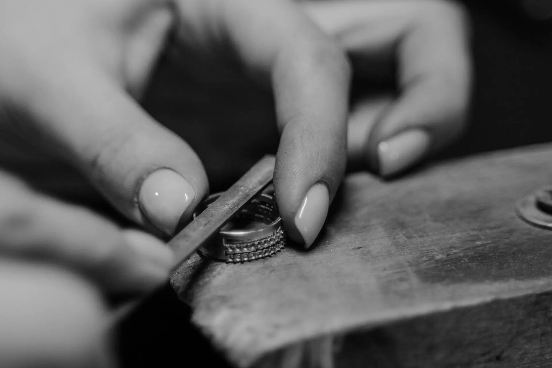 Jewelry maker hands crafting a ring